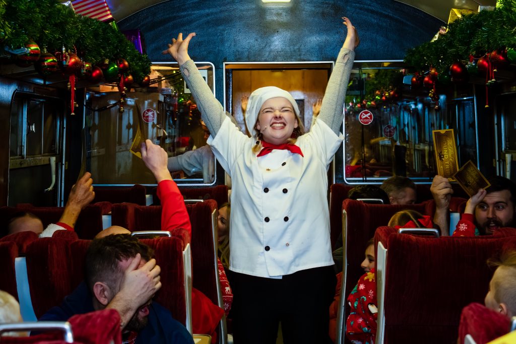 An excited chef on board one of the best Christmas events in Yorkshire THE POLAR EXPRESS™ Train Ride 2022 