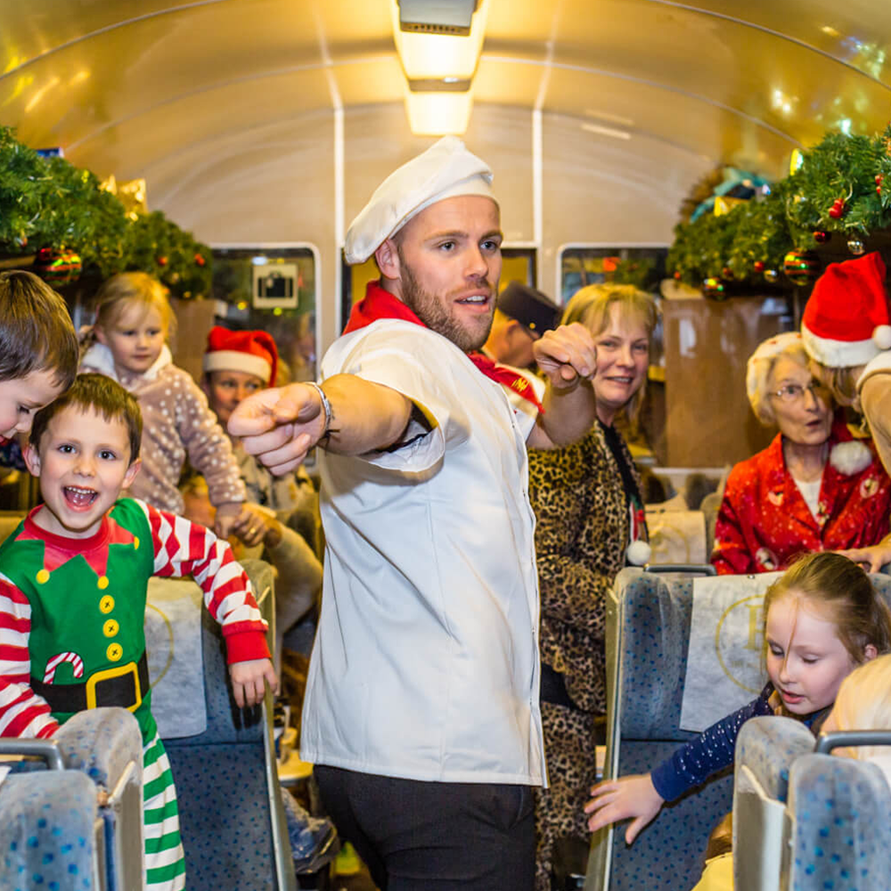 Chef dancing on board The Polar express